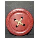 Giant metal button wall art