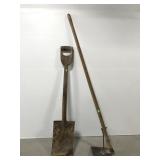 Pair of old farm tools - shovel and hoe