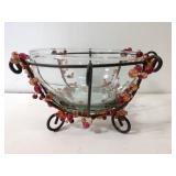 Ornate decorative glass bowl in wire holder