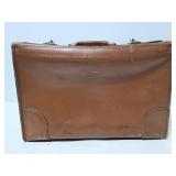 Old vintage wide cowhide briefcase