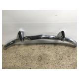 Vintage chrome car bumper, bent