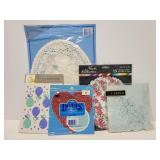Collection of paper lace doilies & cupcake toppers