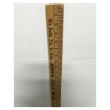 Old advertising wooden yard stick
