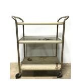 Old metal three tiered rolling cart