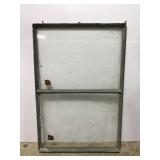 Metal framed window pane