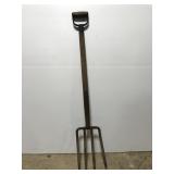 Old pitch fork w/ carved marking