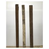Three salvaged wooden farmhouse slat boards