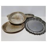 Collection of old and vintage pie tins