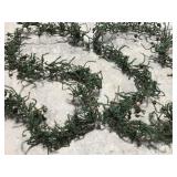 Two strands of rustic pine garland