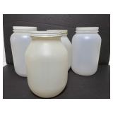 Four large plastic containers