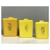 Vintage yellow nesting kitchen canisters