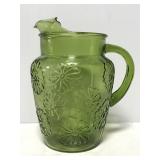 Green glass flower power pitcher