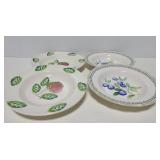 Four painted floral bowls