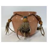 Native American leather & feather pottery bowl
