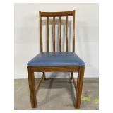 Wooden chair with blue cushion