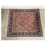 Handwoven red & blue square area rug