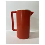 Vintage orange plastic pitcher
