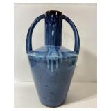 Tall blue glazed pottery vase