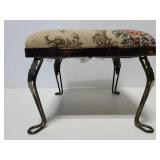 Small metal leg padded foot stool