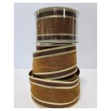Three rolls of brown ribbon