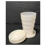 Vintage opaque plastic tumbling travel cup