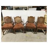 Set of 4 caned-back rolling dining chairs,