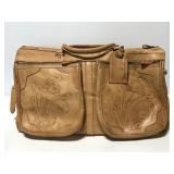 Leather tooled oversized saddle bag style duffel