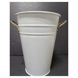 White metal flower bucket