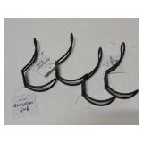Four decorative hooks, black