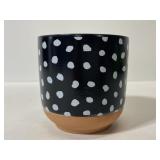 Tiny terra-cotta polka dot planter pot