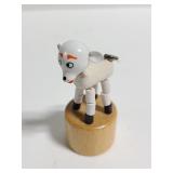 Tiny collapsing wood sheep toy