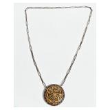Carved wood pendant necklace