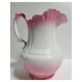 Marked pink and white ceramic water pitcher