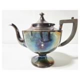 Marked metal teapot