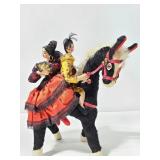 Spanish couple on house figure