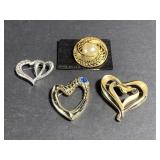 Lot of 4 silver & gold toned brooches