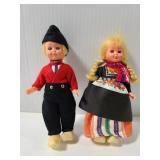 Two small plastic mold Dutch style dolls