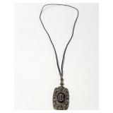 Ornate metal pendant necklace