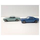 Pair of old toy cars