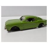 Vintage olive green toy car