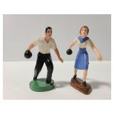 Man and woman bowling figures