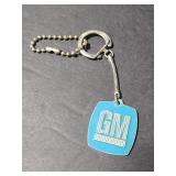 Vintage GM seatbelt safety key chain