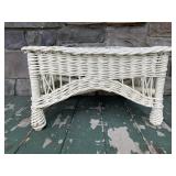 White wicker side table/ottoman