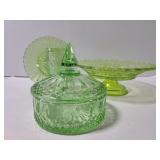 Four pieces of green glass