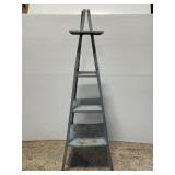 Vintage metal tower yard art