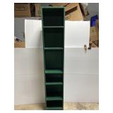 Tall green bookcase