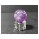 Amethyst quart sphere on lucite stand