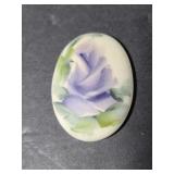 Tiny hand painted porcelain emblem by M. Brinks