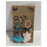 Vintage 80s plastic bell charm earrings
