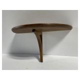 Small wooden half moon shelf